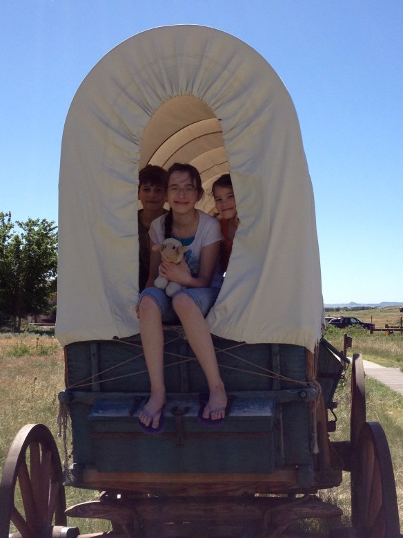After I made them climb up for the picture, I saw a sign that said to stay off the wagons. Laura Ingalls would smack me if she knew I'd broken the rules!