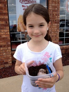 This is our youngest with Missus, her hermit crab.