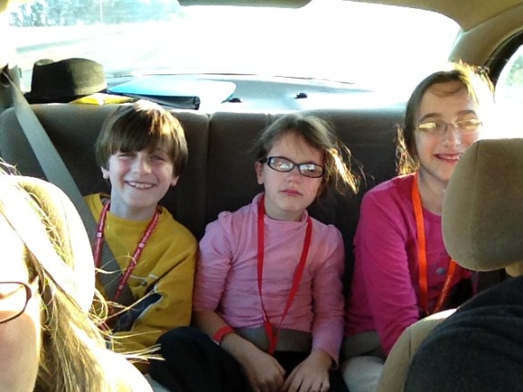 The picture from our three-hour trip home from last year's ICOM. Note the priceless expression of the middle one. One of my all-time favorite travel pictures.