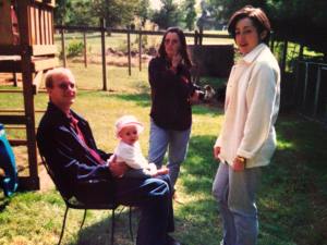 The Picture: Andrew on the left, me on the right, an aunt and a niece with us. That's not our baby, by the way. That was before offspring. Interestingly enough, I look surprisingly like my sister.